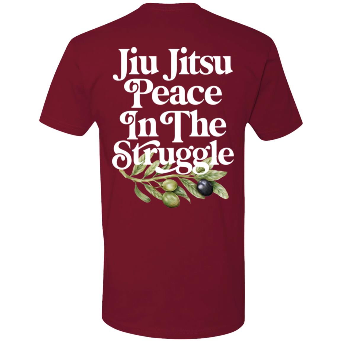 A **Peace In The Struggle - Cardinal Red** with white text that reads "Jiu Jitsu Peace In The Struggle," featuring an illustration of olive branches, embodies mindfulness and calm amidst the struggle.