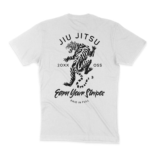 Back view of a white T-shirt featuring a black illustration of a tiger and text: "JIU JITSU 20XX OSS Earn Your Stripes Paid in Full." Earn Your Stripes - White is perfect for those who earn their stripes.