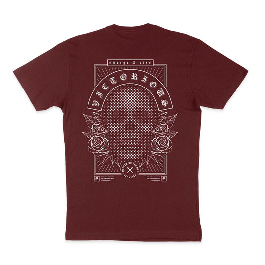 A burgundy t-shirt featuring a skull and roses design, perfect for Emerge Victorious - Maroon practitioner.