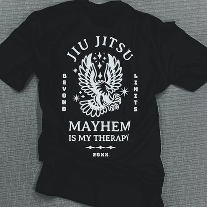 Beyond Limits - Black T-shirt featuring a striking white eagle design and bold lettering: 'Jiu Jitsu,' 'Beyond Limits,' and 'Mayhem is My Therapy.' Show your passion for Jiu Jitsu and prove that you're always pushing beyond limits.