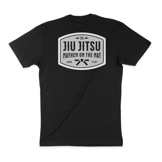 Mayhem Saloon - Black T-shirt featuring a "Jiu Jitsu, Mayhem On The Mat" design on the back, with added text "Grind & Glory" and various stylized saloon elements.