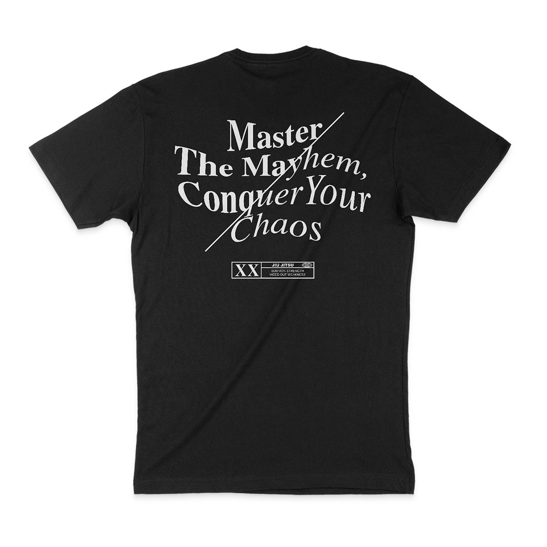 Master The Mayhem / Conquer Your Chaos - Black: Black T-shirt with the text "Master the Mayhem, Conquer Your Chaos" in white letters on the back. A Roman numeral "XX" and additional small text are below the main message, capturing the essence of order over chaos.