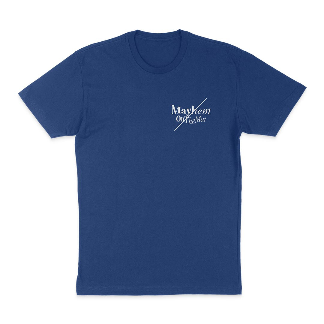 A blue t-shirt with white text on the upper left reading "Master The Mayhem / Conquer Your Chaos - Royal," designed for those ready to Master The Mayhem.